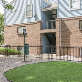 Fenced in dog park with green space